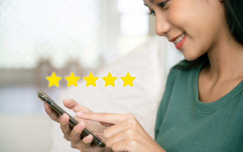 Woman looking up what the best smartphone to buy is this year with Tuckersmith Communications